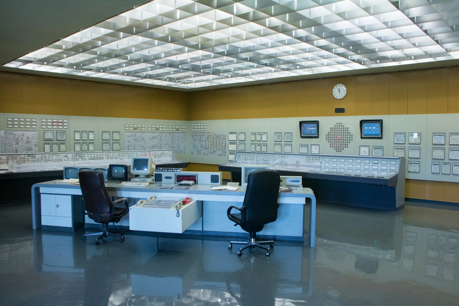 24/7 security monitoring center with banks of screens